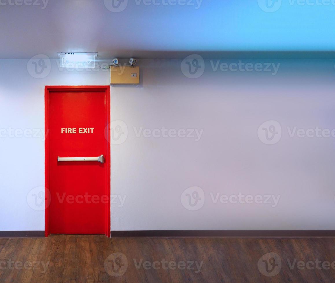 Fire exit door. Fire exit emergency door red color metal material photo