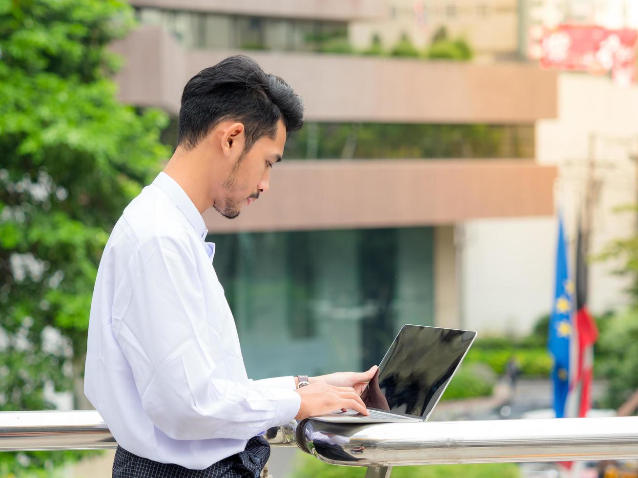 Young Burmese businessman find data in laptop ,It's time to talk about business photo