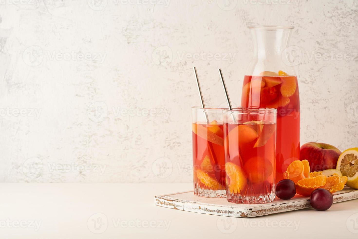 Stewed fruits in Glass Tube on pastel background side view copy space photo