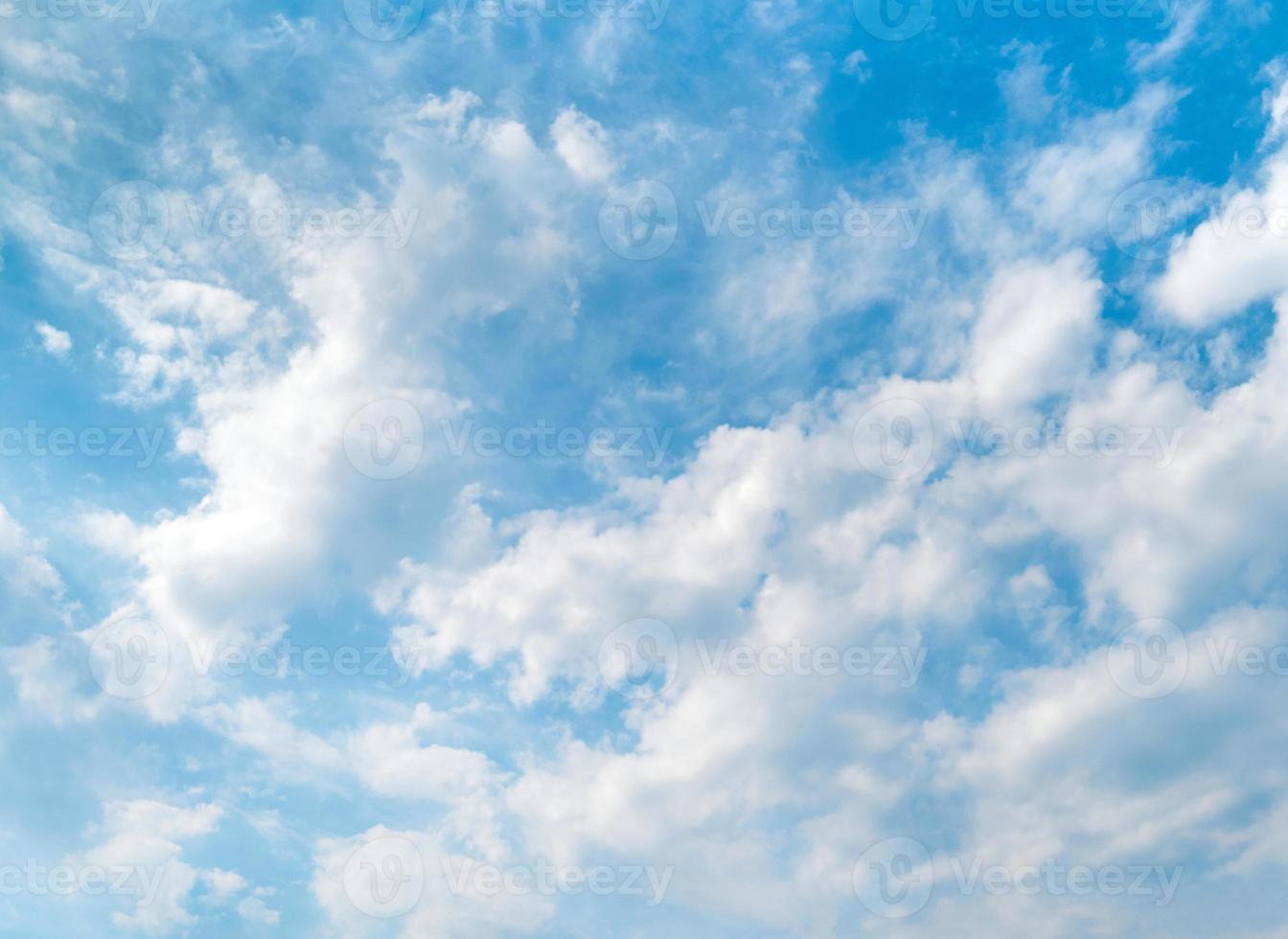 Blue sky and beautiful white clouds. Bright sunny day. Background with copy space photo