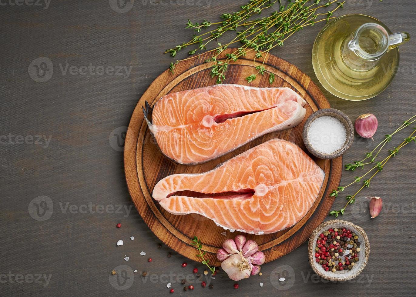 Two salmon steaks, top view, copy space. Fish fillet, large sliced portions on photo