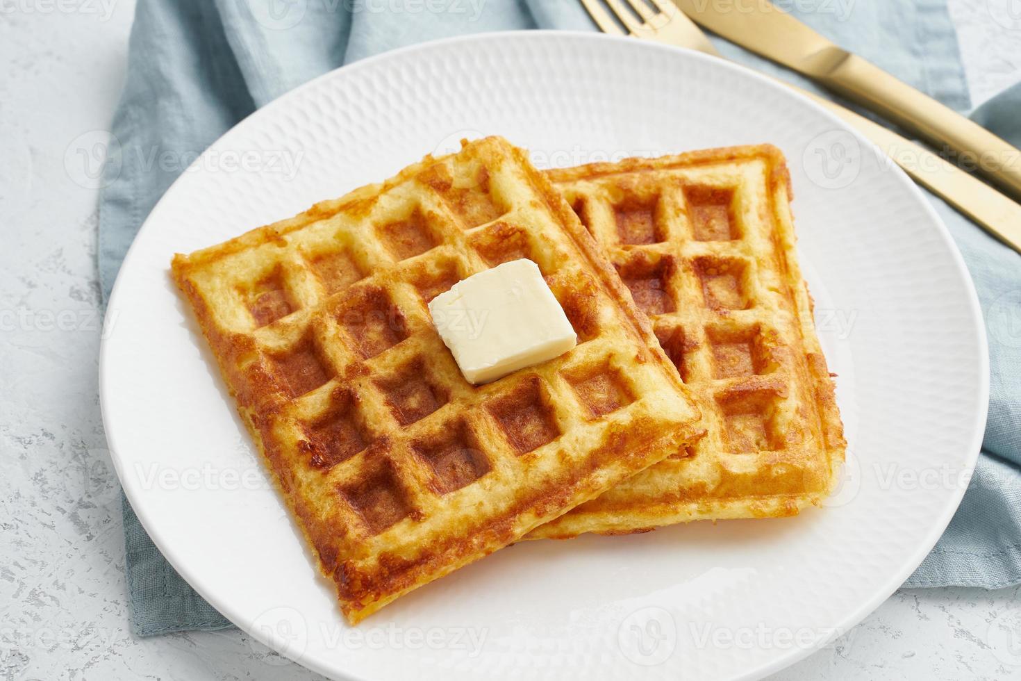 Chaffle, ketogenic diet health food. Homemade keto waffles with egg, mozzarella cheese photo