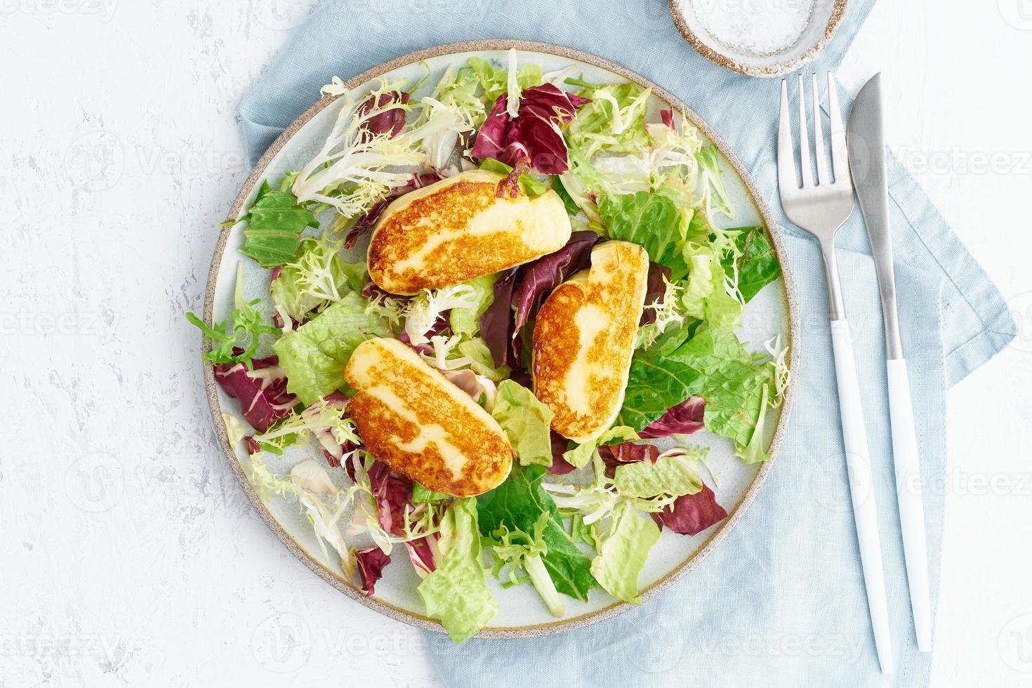 Cyprus fried halloumi with healthy salad. Lchf, pegan, fodmap, paleo, scd, keto photo