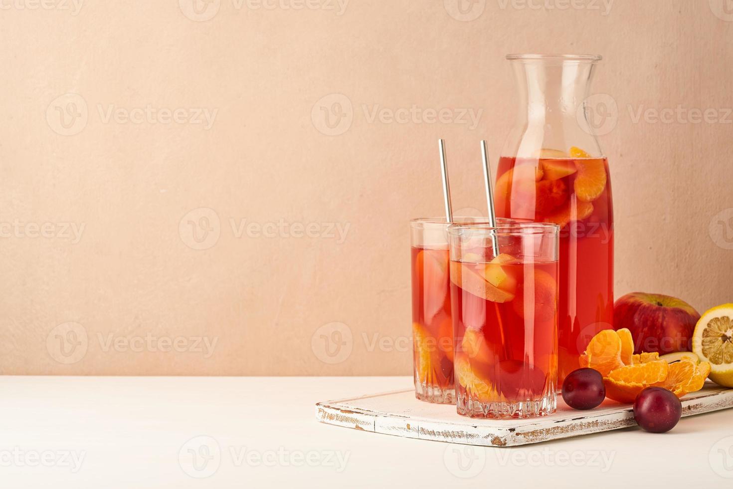 Stewed fruits in Glass Tube on pastel background side view copy space photo