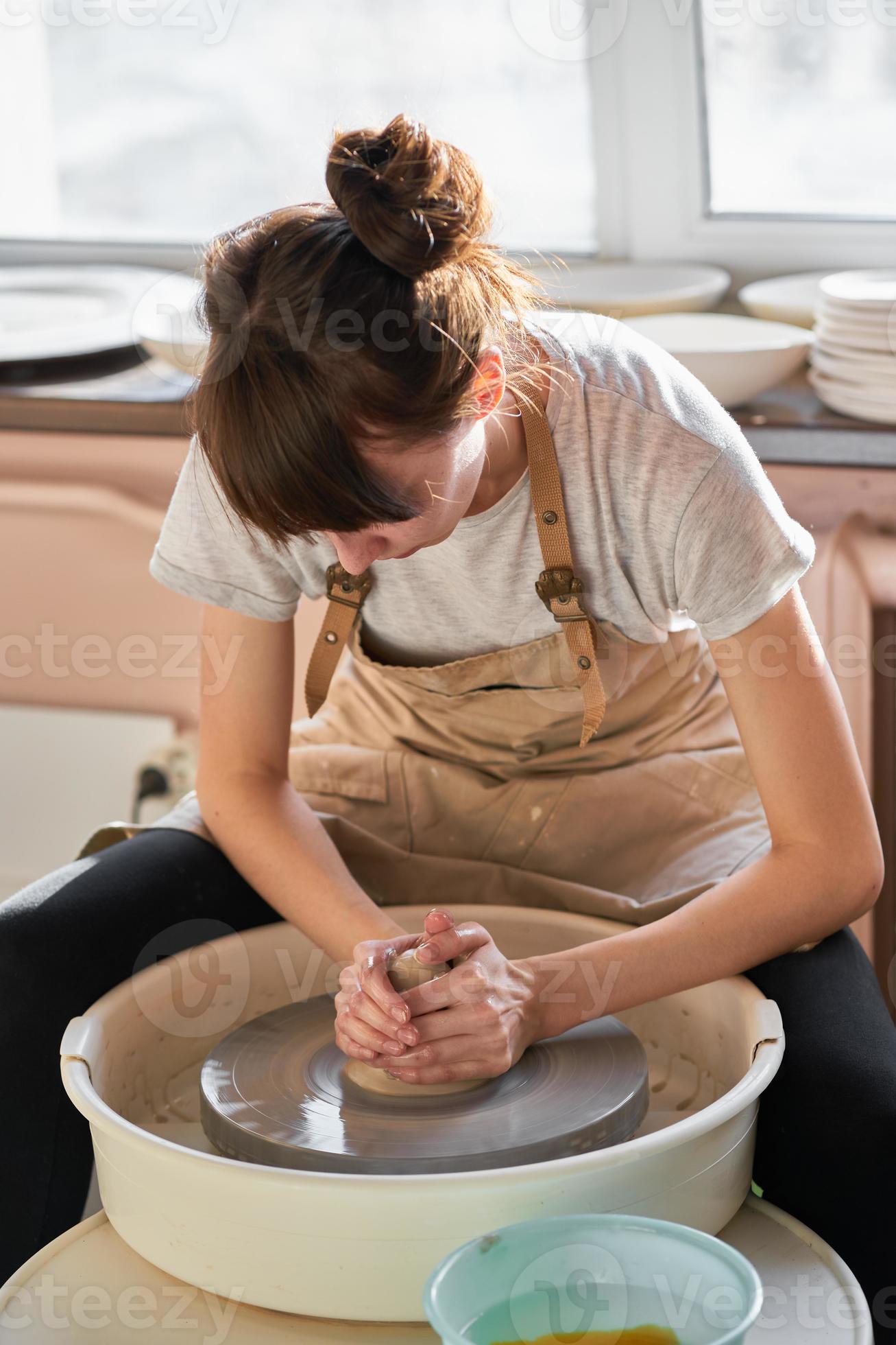 Woman freelance, business, hobby. Woman making ceramic pottery 7543970
