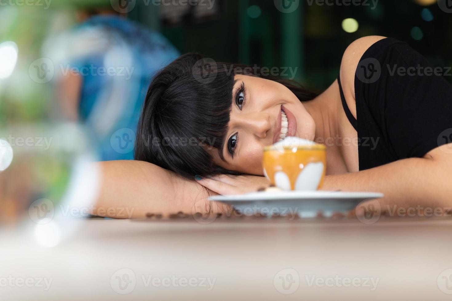 Woman drinking coffee table. Women in cafe. photo