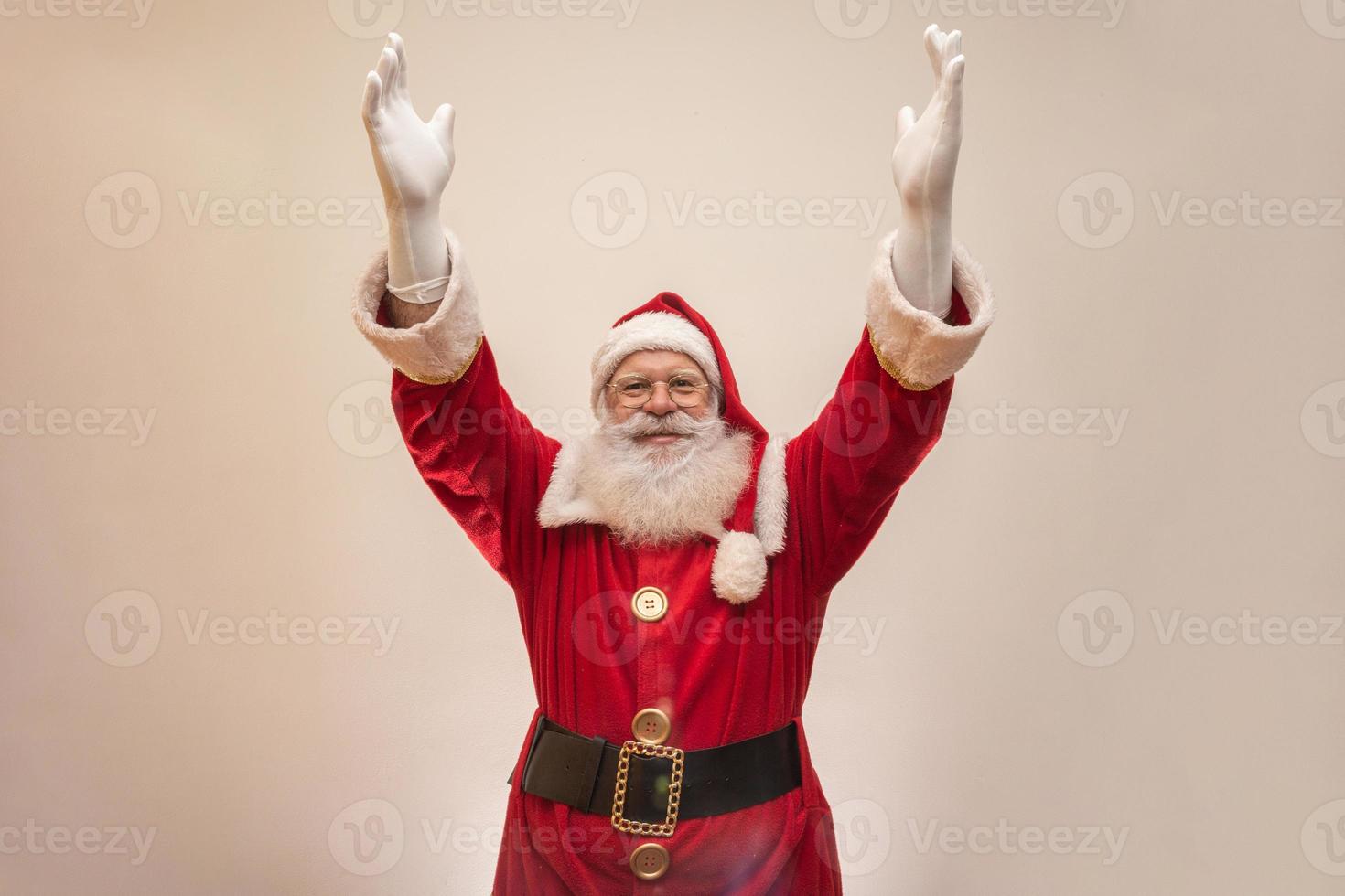 Santa Claus on white background with copy space. Presenting. photo