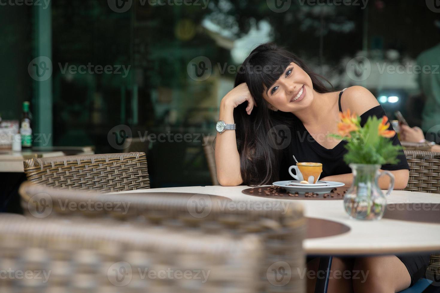 Woman drinking coffee table. Women in cafe. photo