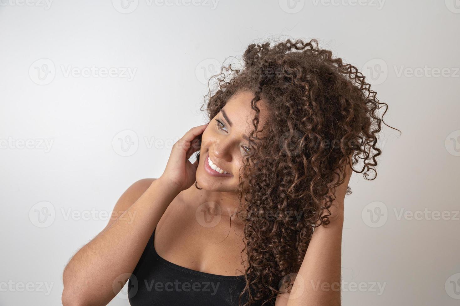 Beauty portrait of african american woman with afro hairstyle and glamour makeup photo