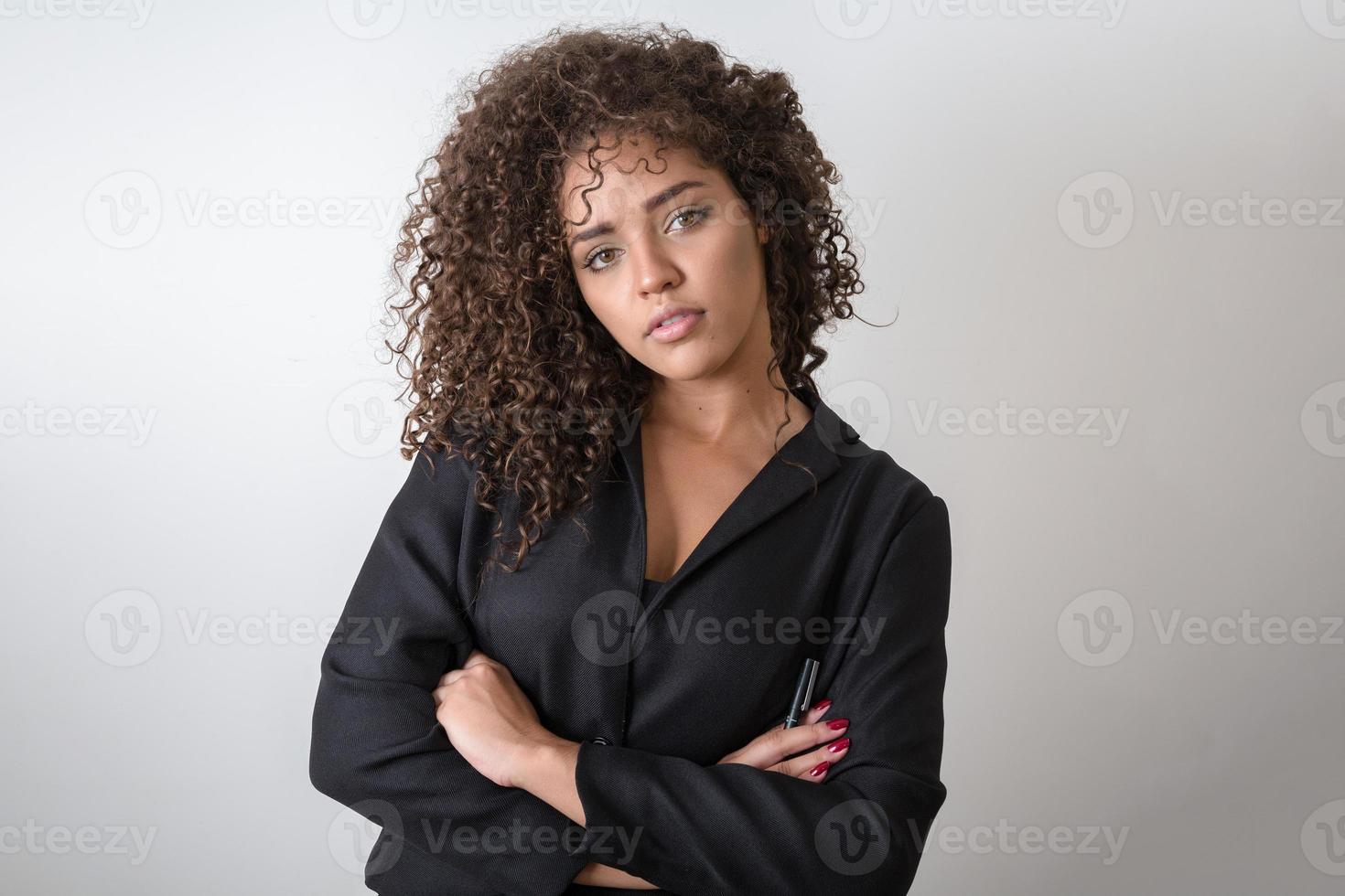 Business black woman on a grey background photo