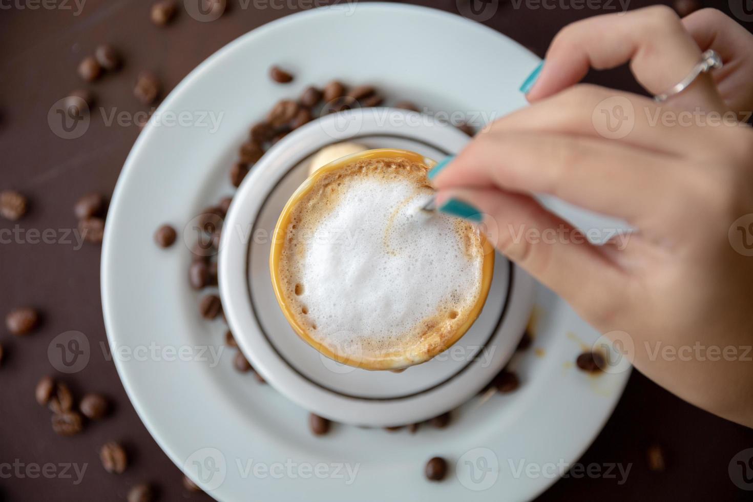 Woman drinking coffee table. Women in cafe. photo