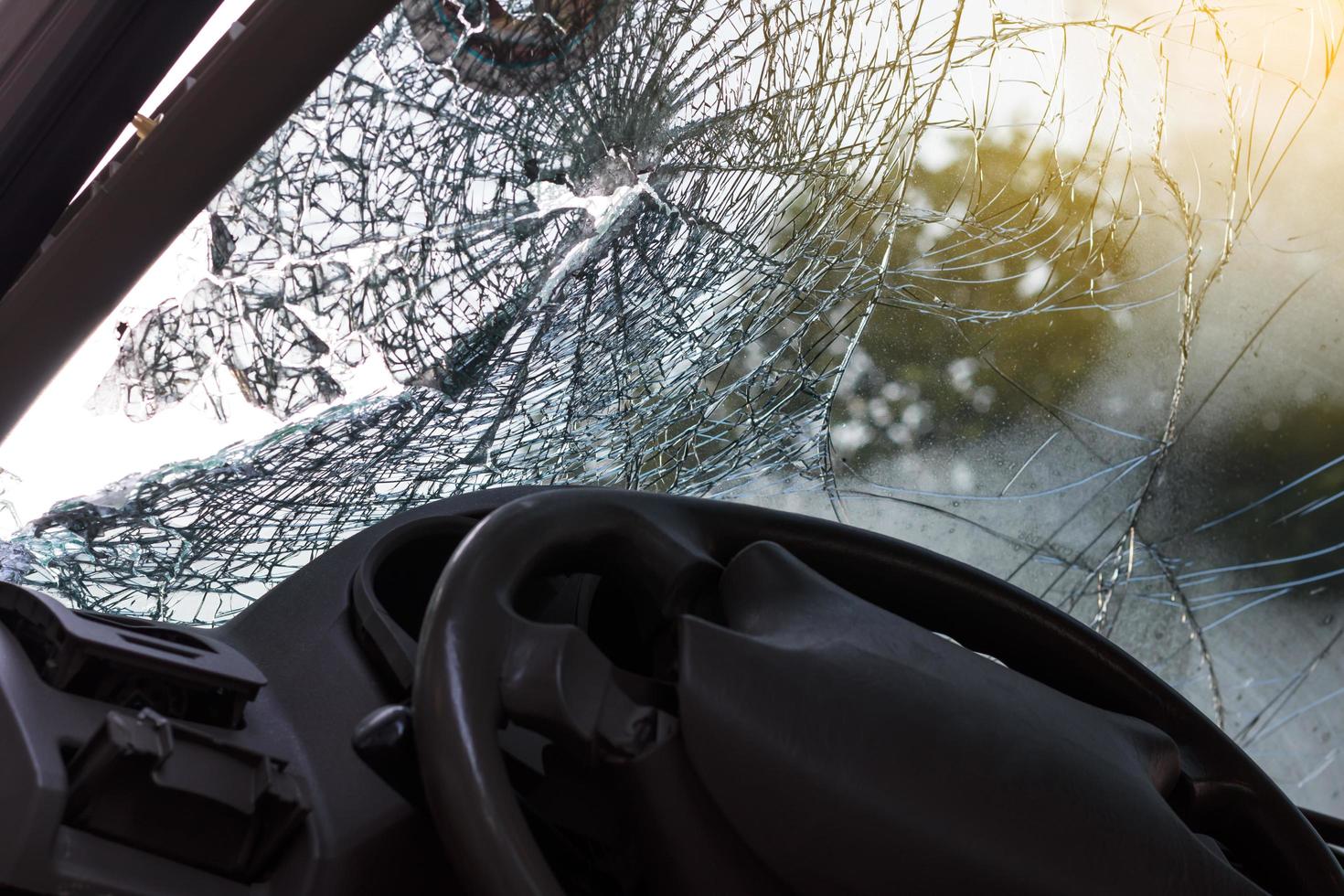 In the car, the steering wheel bent from the accident. photo