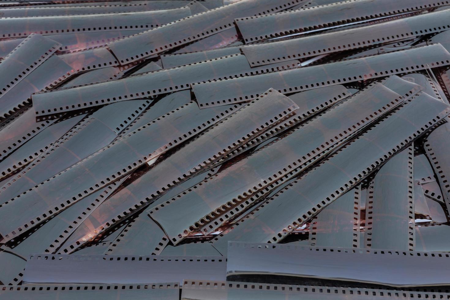 The vast amount of 35mm film backgrounds that are stacked flat on top of each other. photo