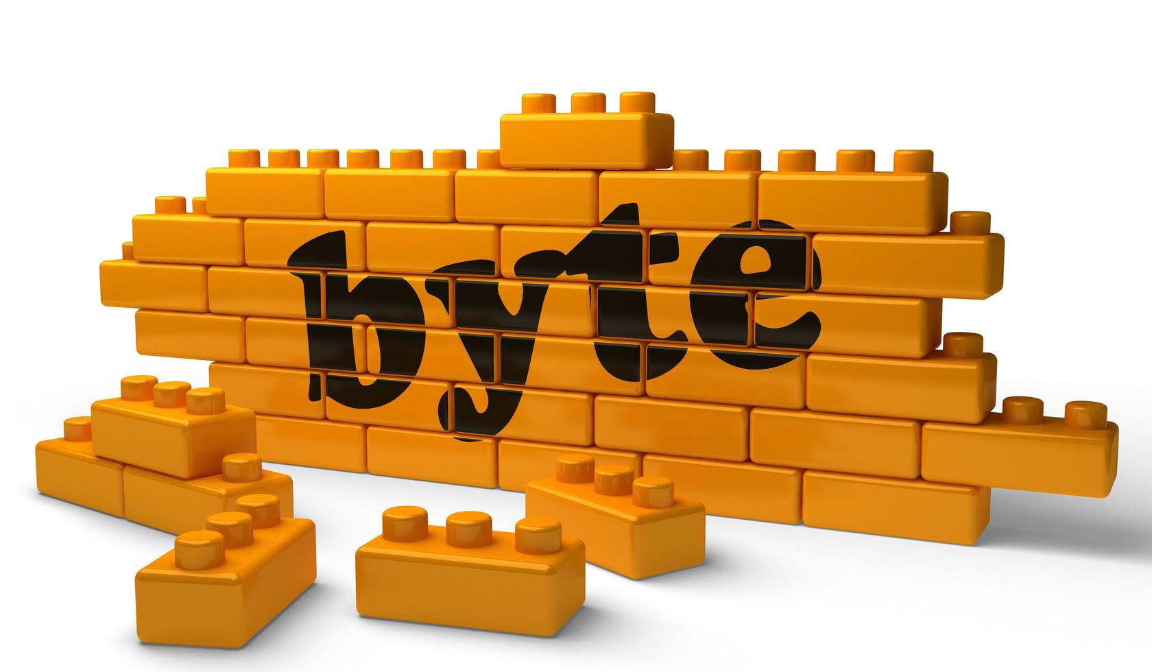 byte word on yellow brick wall photo