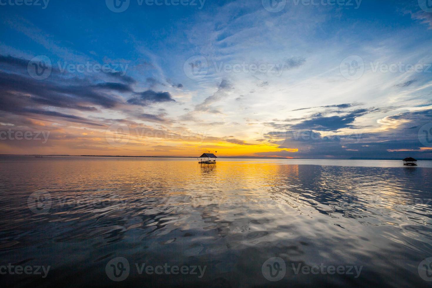 Sunset at the river sky and cloudiness photo
