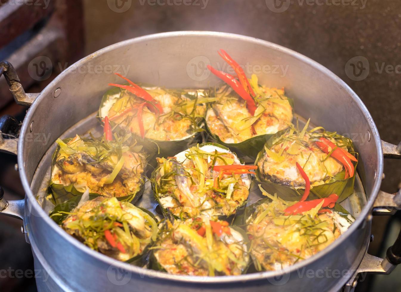 Steamed fish with curry paste. photo