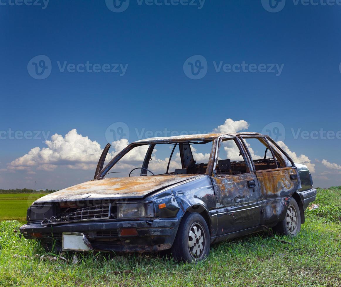 Burnt car in rural Thailand. photo