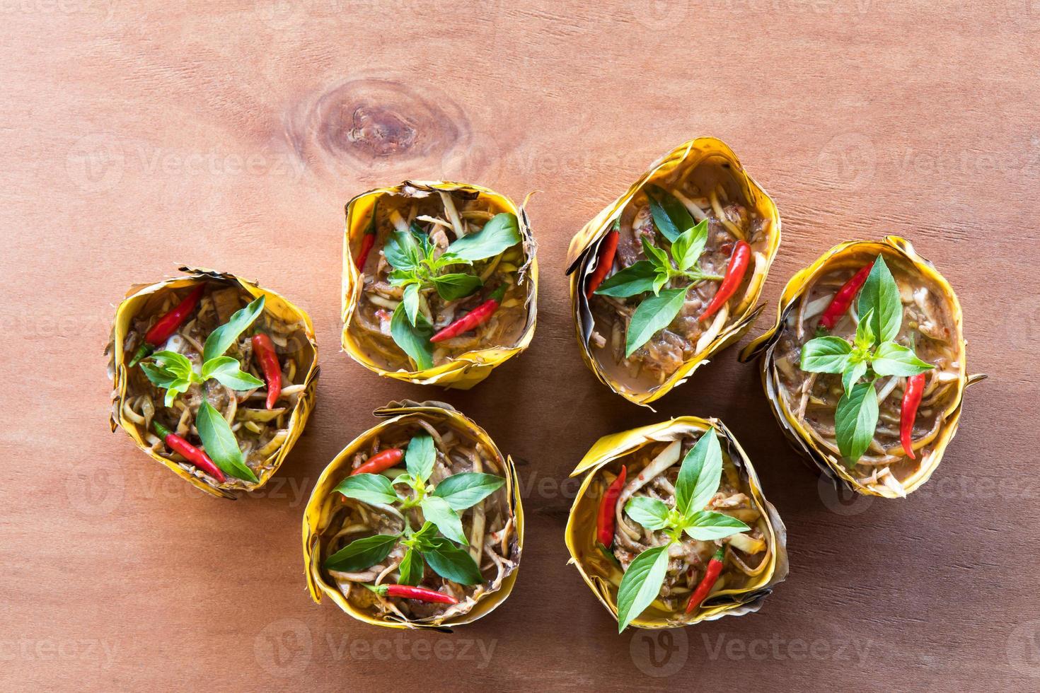 Steamed fish with curry paste banana blossom. photo
