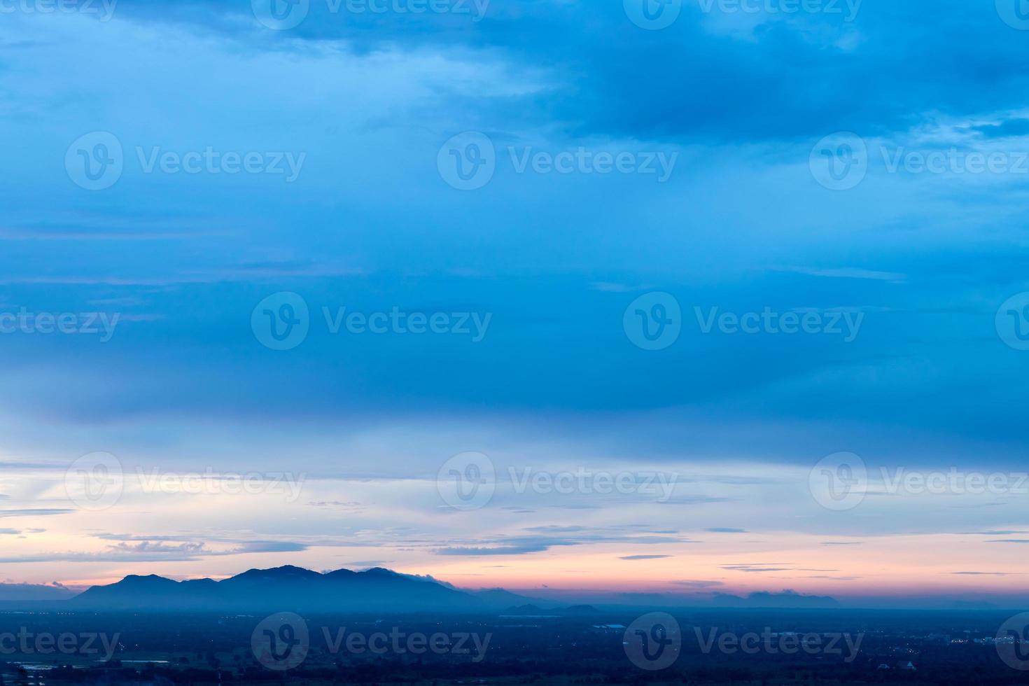 Evening sky scenery over the mountainous countryside. photo