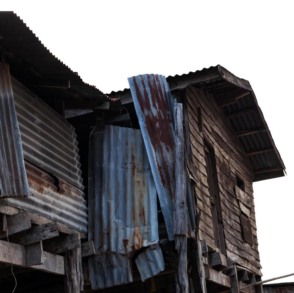 Old wooden house is damaged. photo