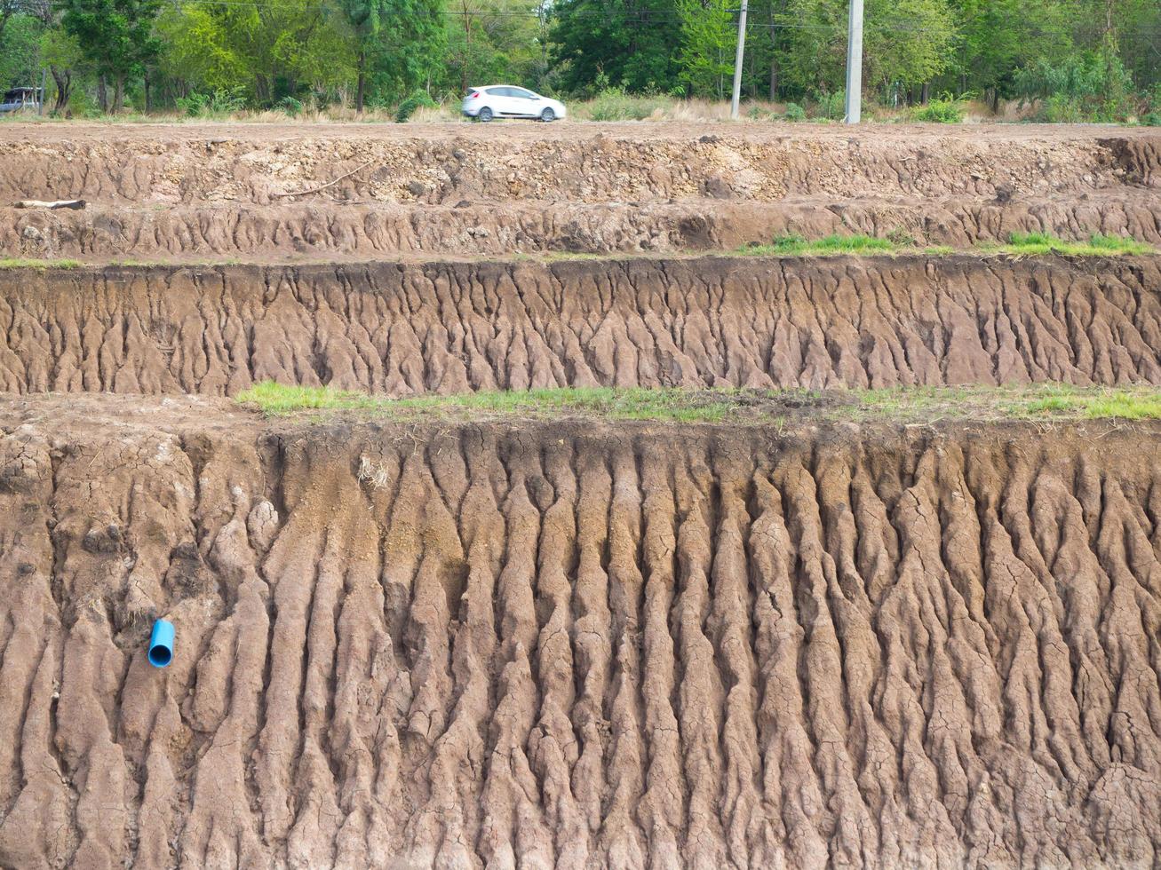 Cars with soil erosion coast. photo