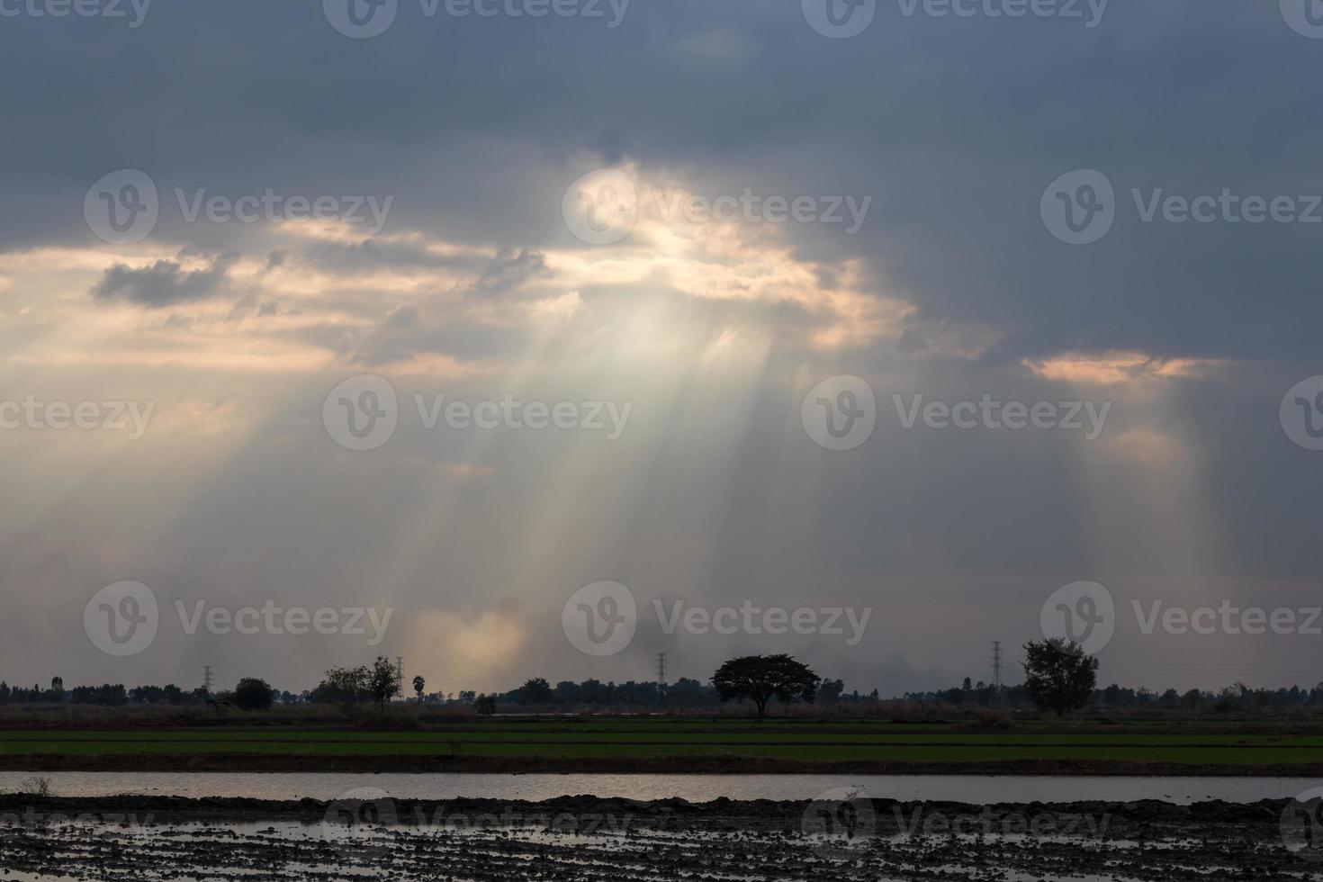 Cloudy with light shining through the countryside. photo