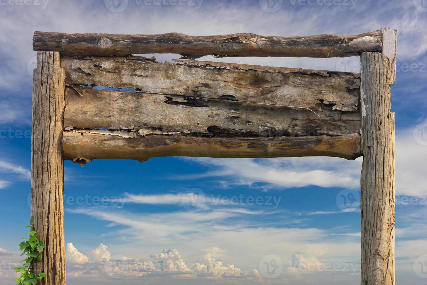 Old wooden stick with cloud and sky. photo