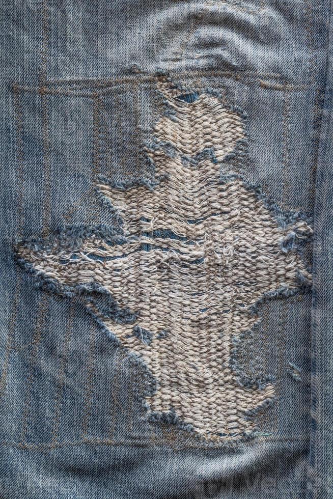 Jeans repairs are artistic. photo