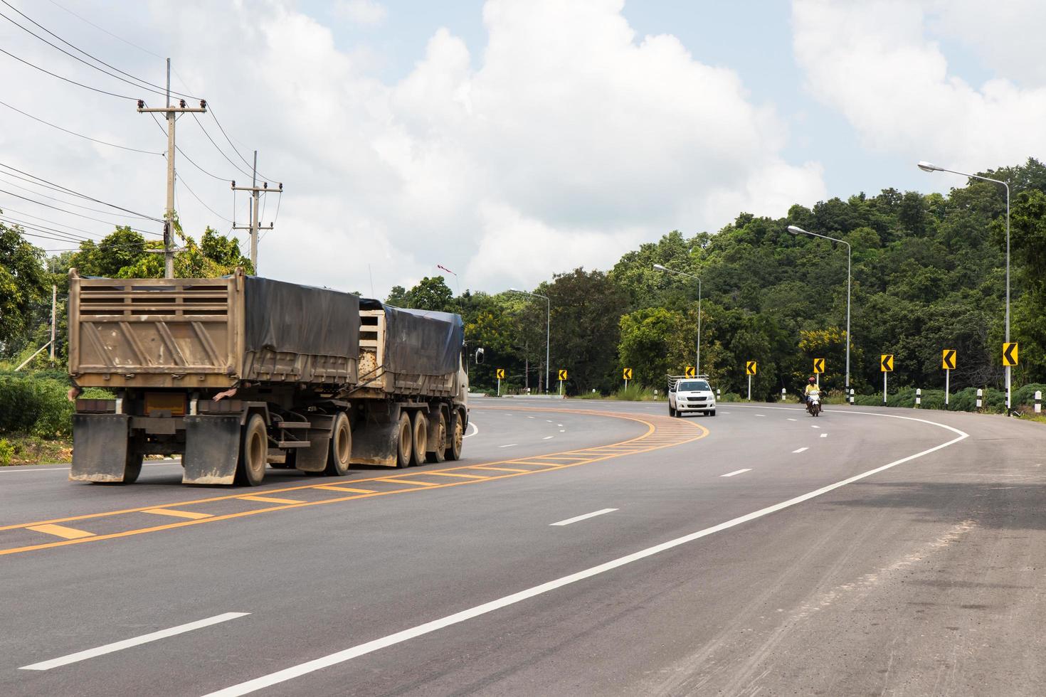 Trailer to the vehicle on a curve. photo