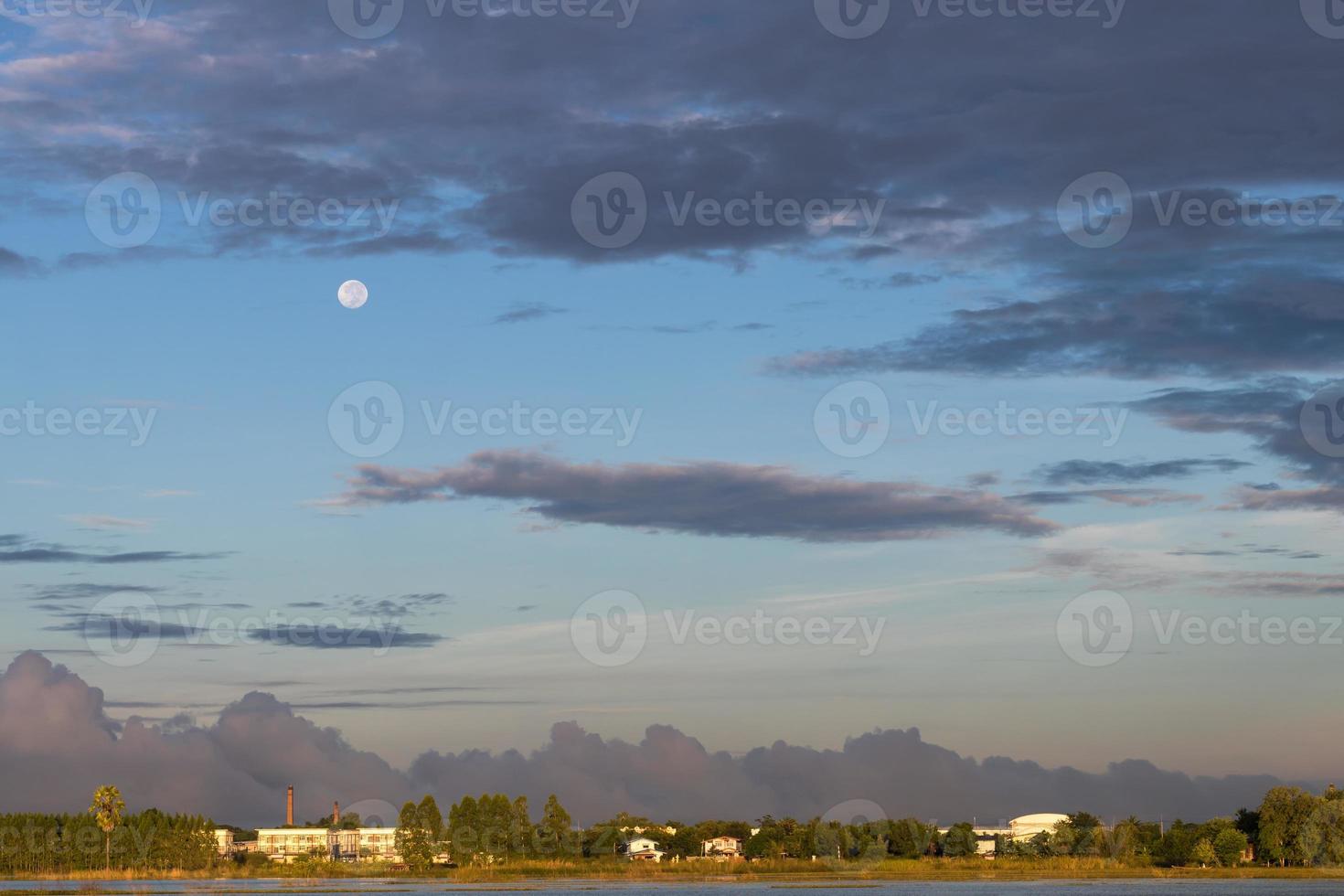 Cloudy sky and moon early morning. photo