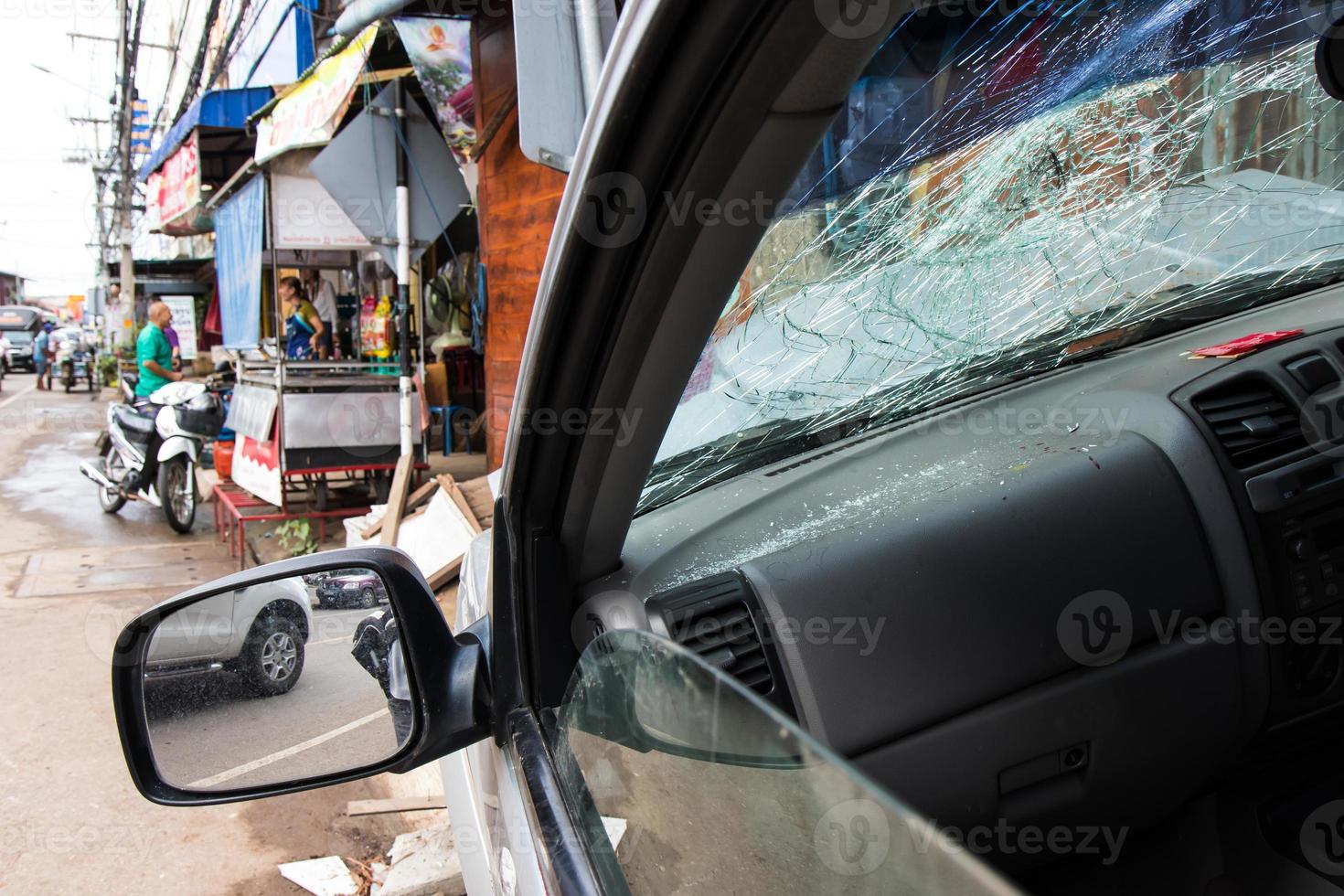 Windshield accident near shops. photo