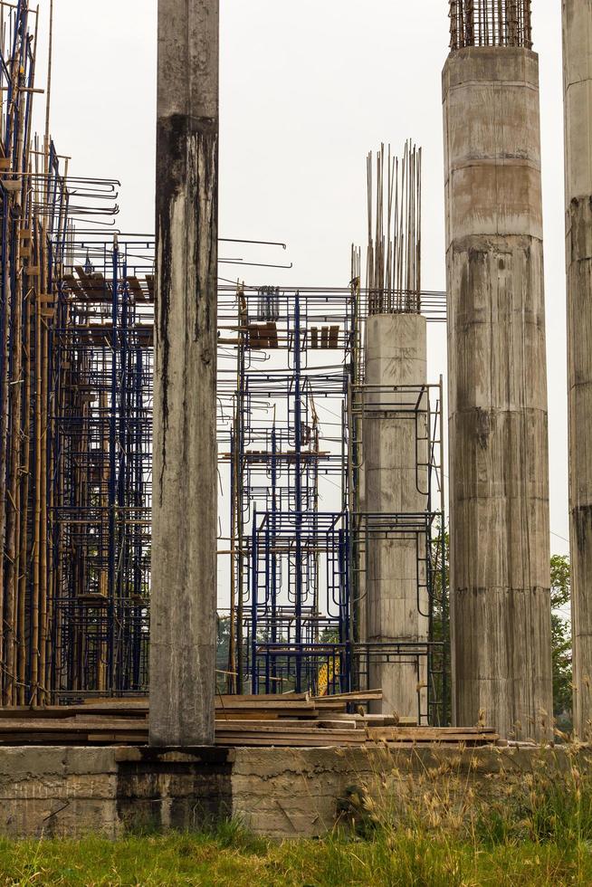 Concrete construction scaffolding poles. photo