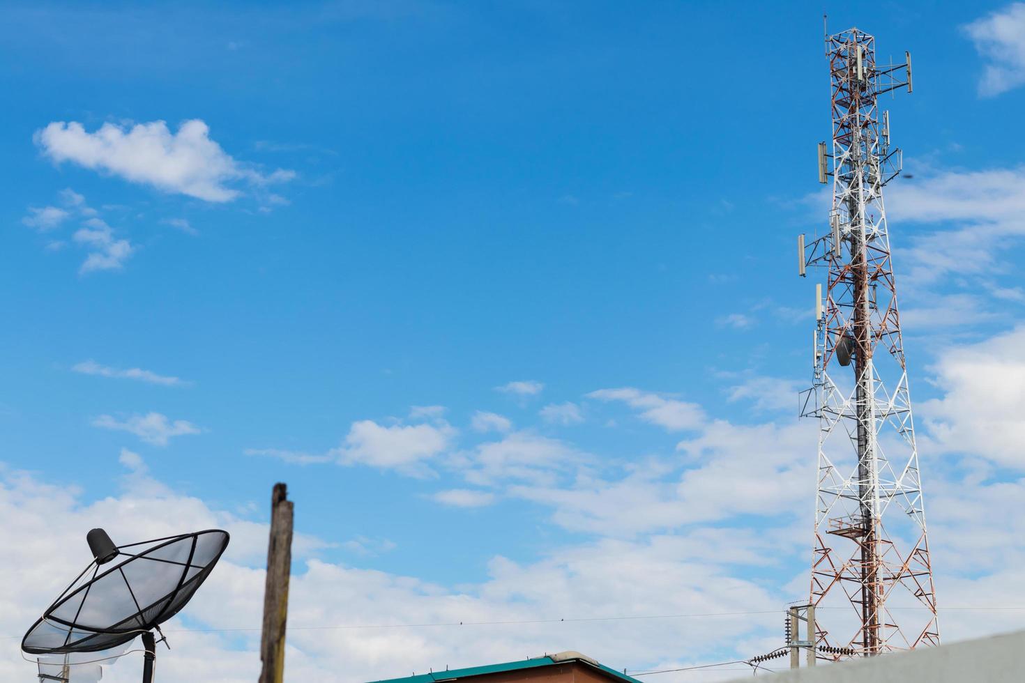 Telecom towers with satellites. photo