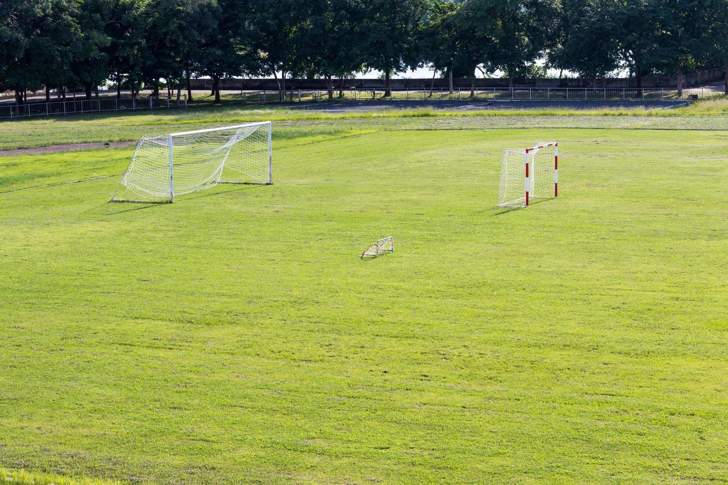 Green lawn with a football goal. photo