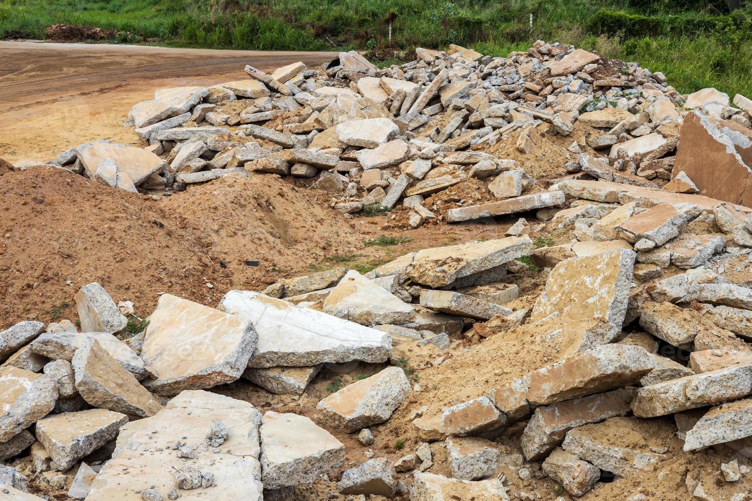 A view of the rubble of many large concrete blocks that have been demolished. photo