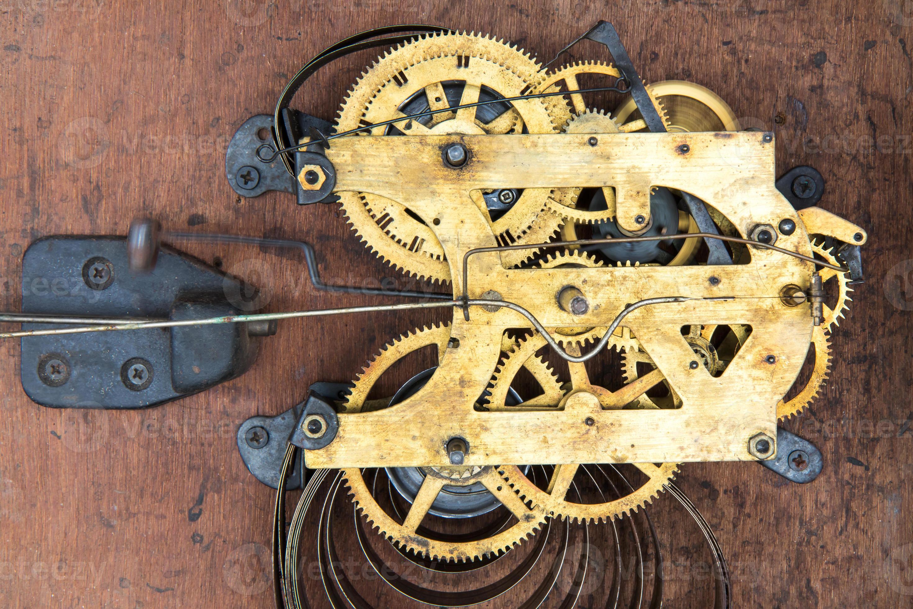 Antique clock winding mechanism. 7557706 Stock Photo at Vecteezy