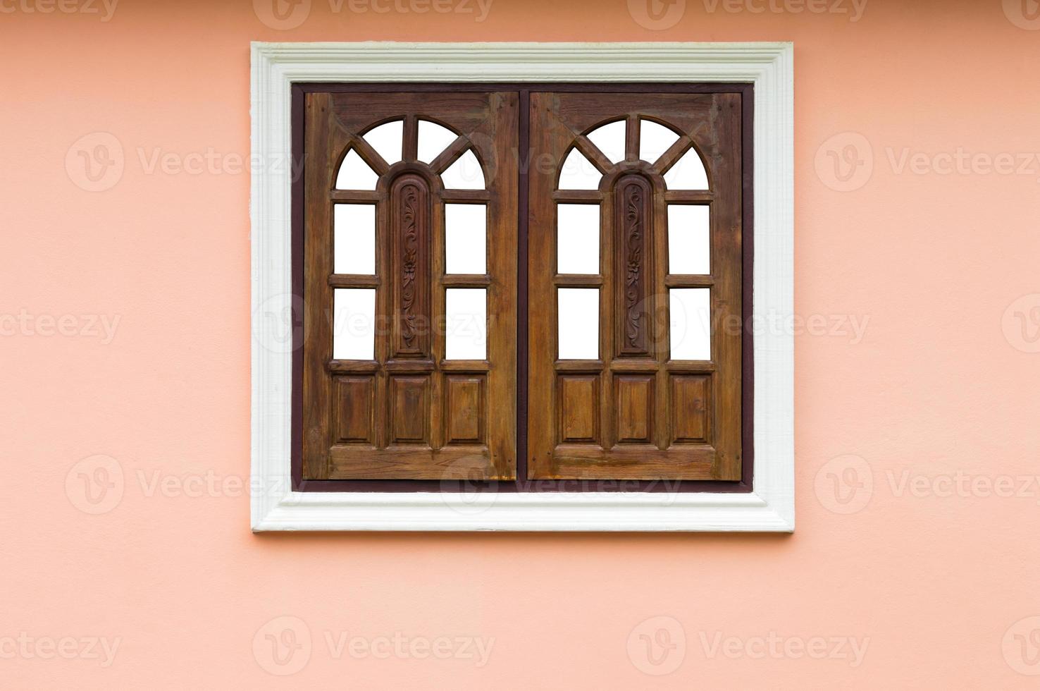 Wooden windows in concrete frames. photo