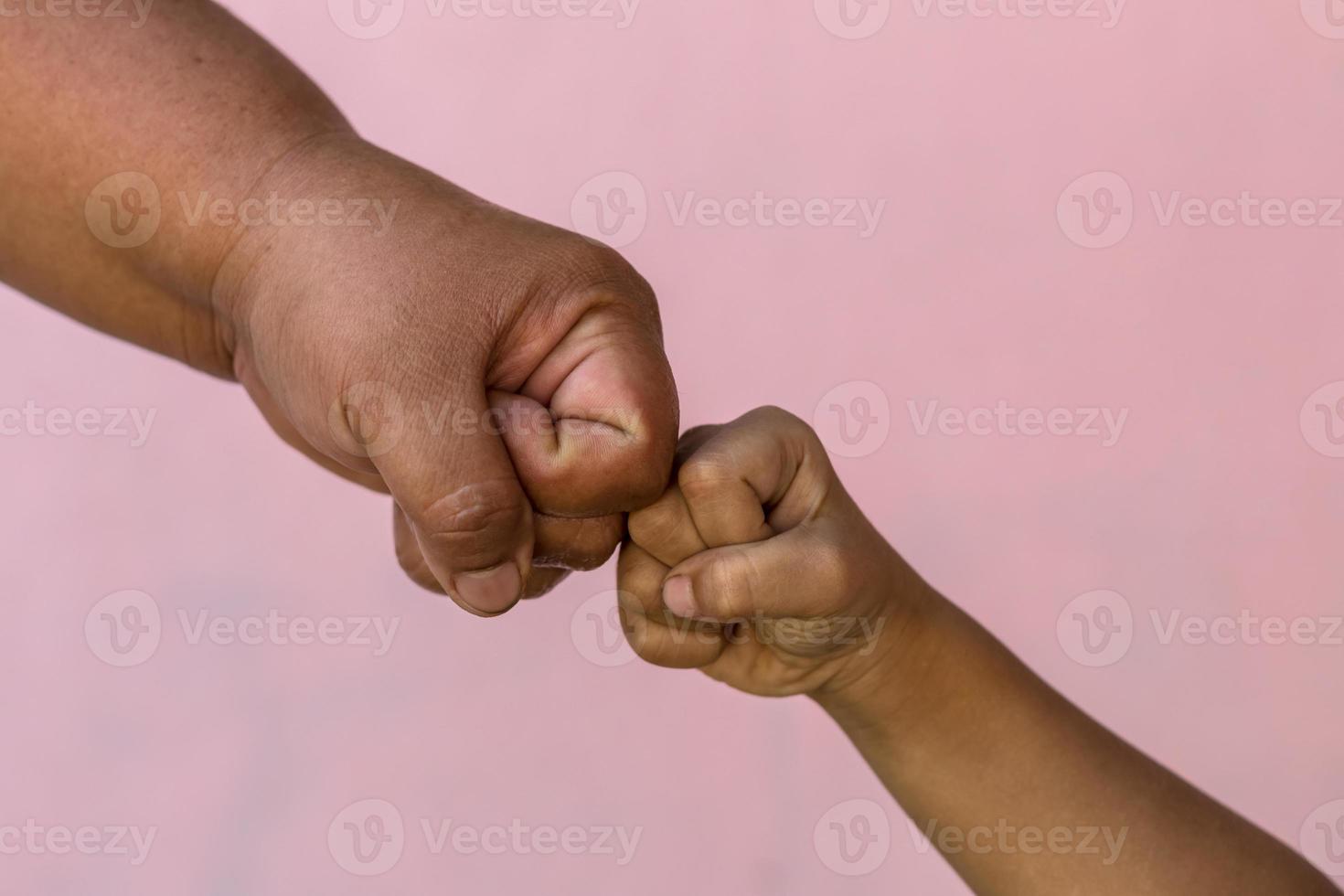 Fat woman hands fist bumps with children. photo