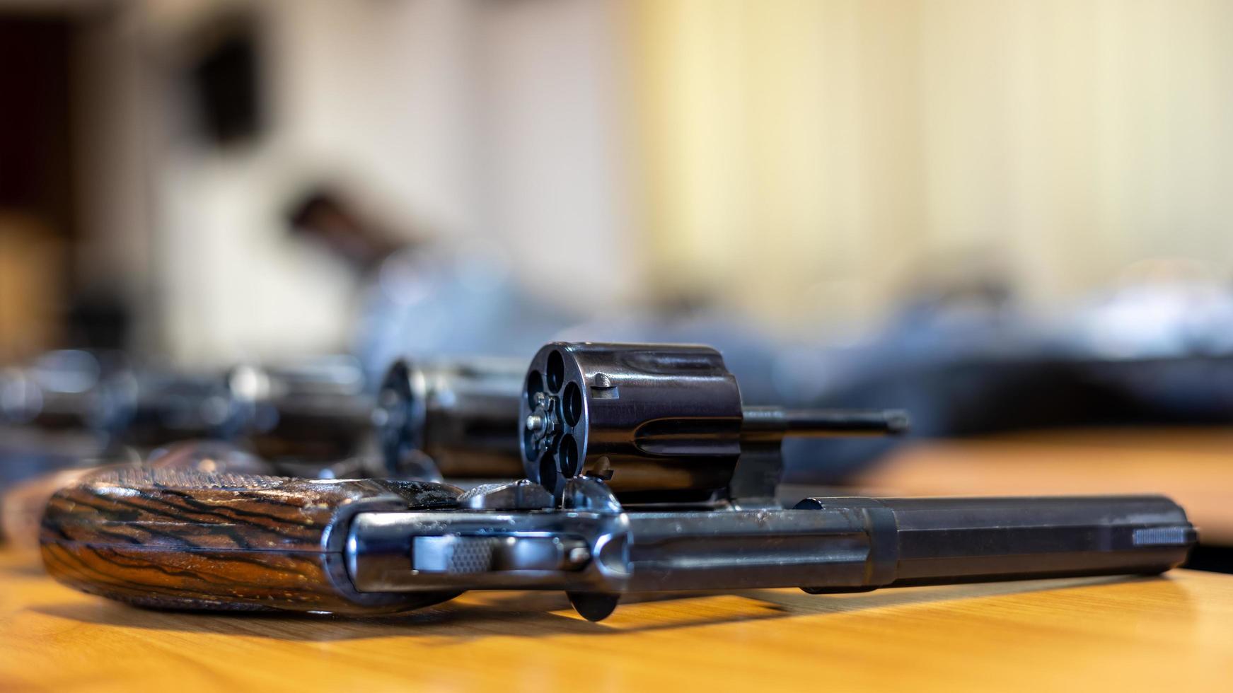 Close-up shot of .38 revolvers lined up. photo