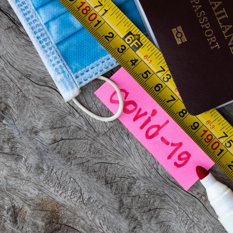 Write COVID-19 near measurements and passports. photo