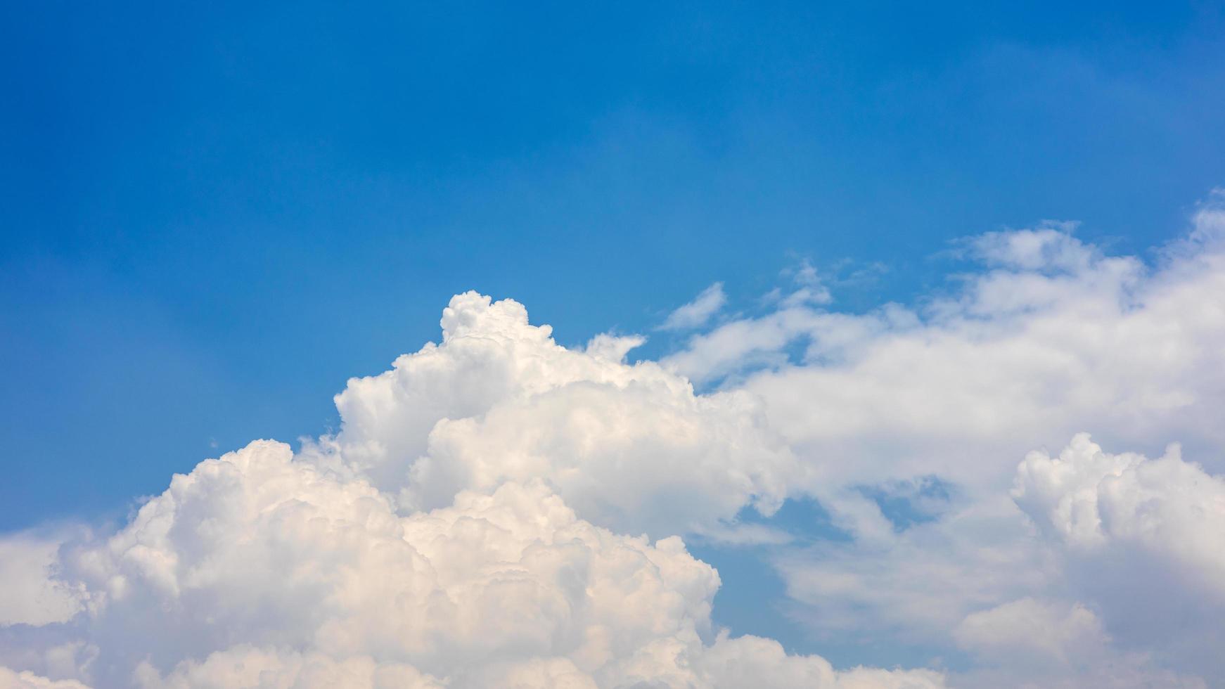 Fluffy clouds float in the sky during the day. 7559774 Stock Photo at