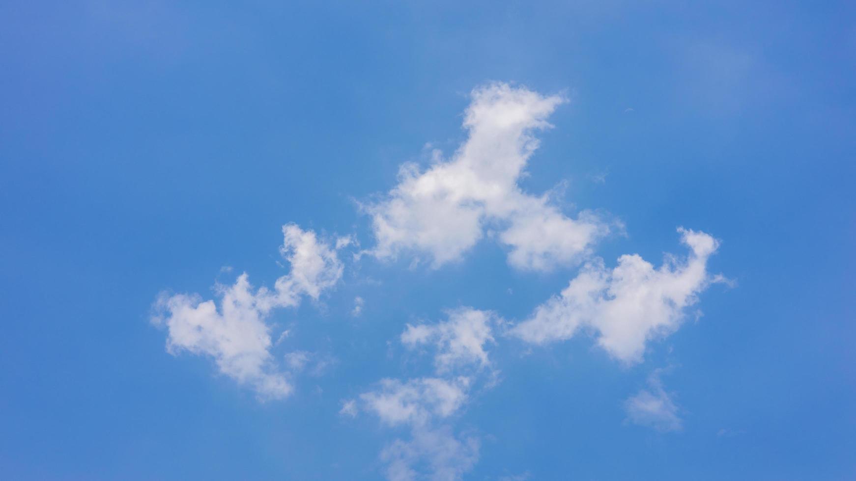 Fluffy clouds float in the sky during the day. 7560143 Stock Photo at