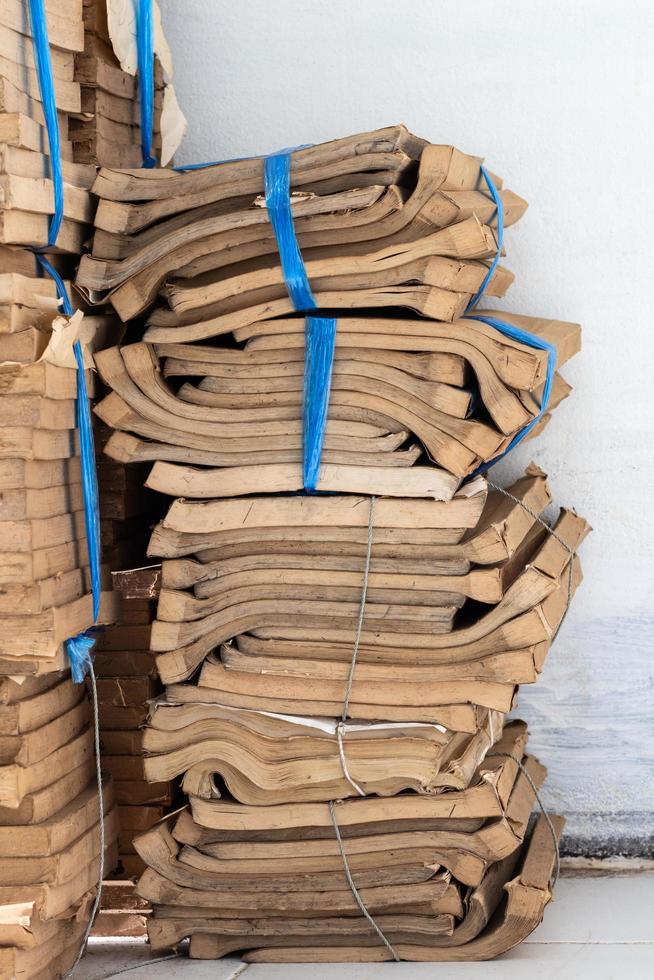 Many old books were stacked together. photo