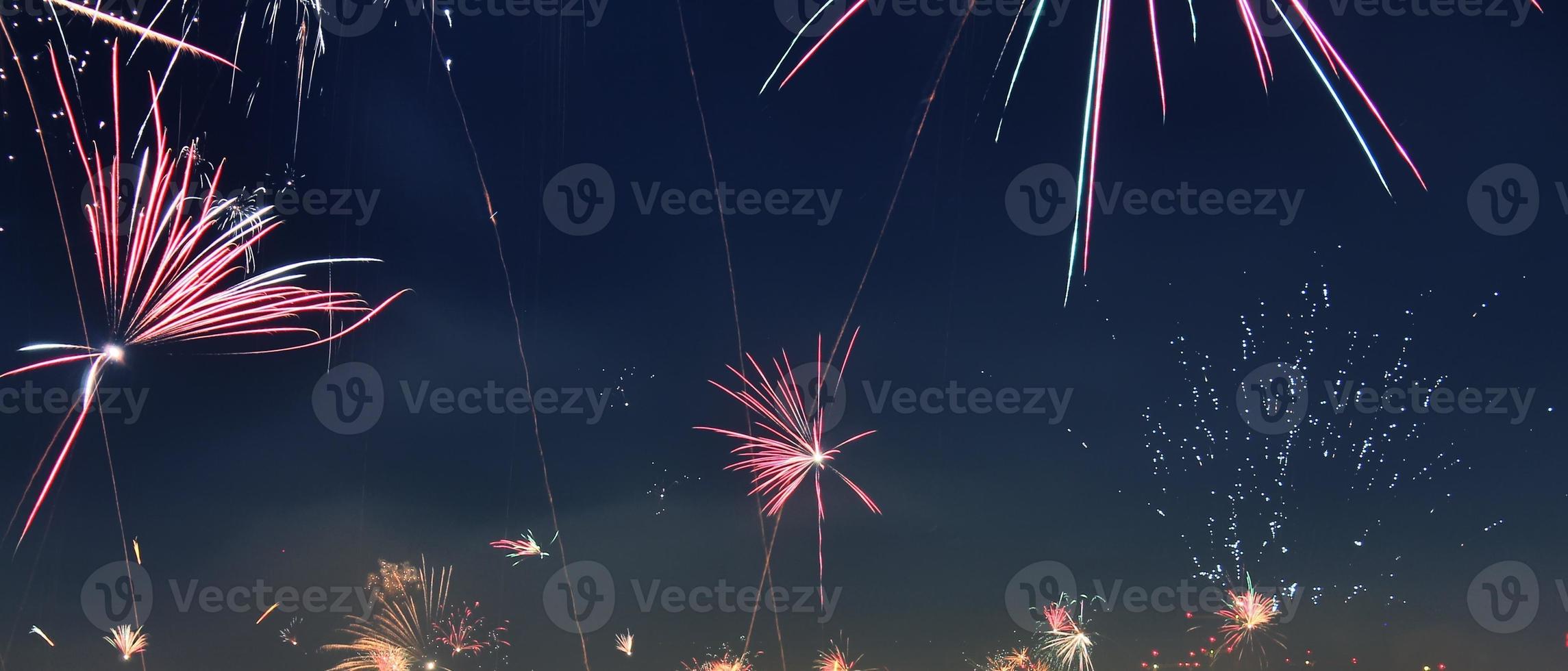 Long time exposure of fireworks over the roofs of vienna photo