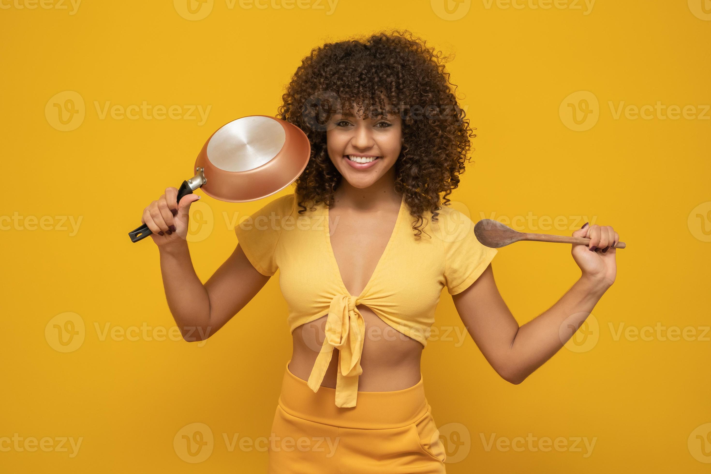 Cooking utensils. Cooking woman in kitchen with frying pan and wooden  spoon. Housewife dancing. 7562859 Stock Photo at Vecteezy