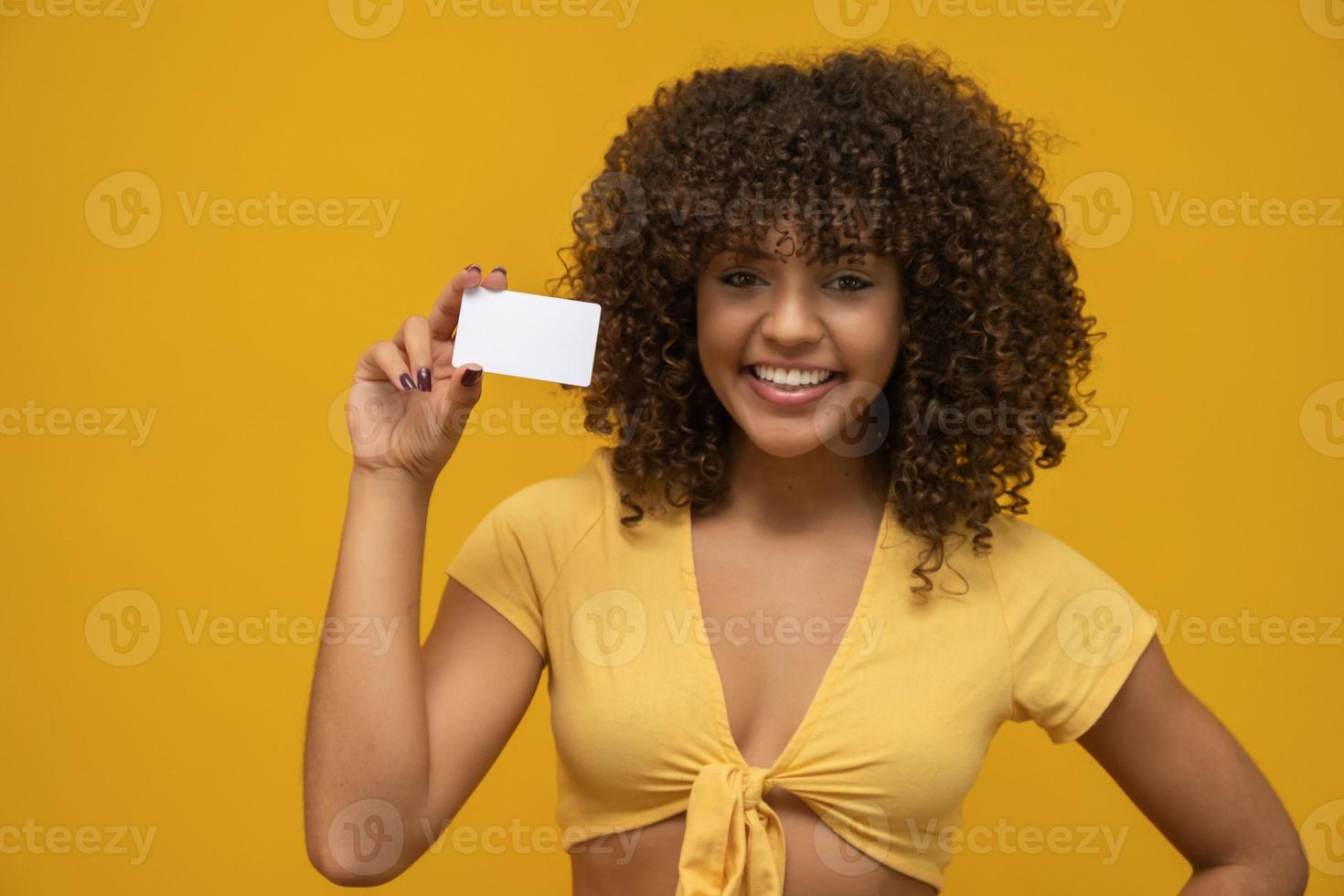 Young woman hand hold blank white card mockup with rounded corners. Plain call-card mock up template holding arm. Plastic credit namecard display front. Check offset card design. Business branding. photo