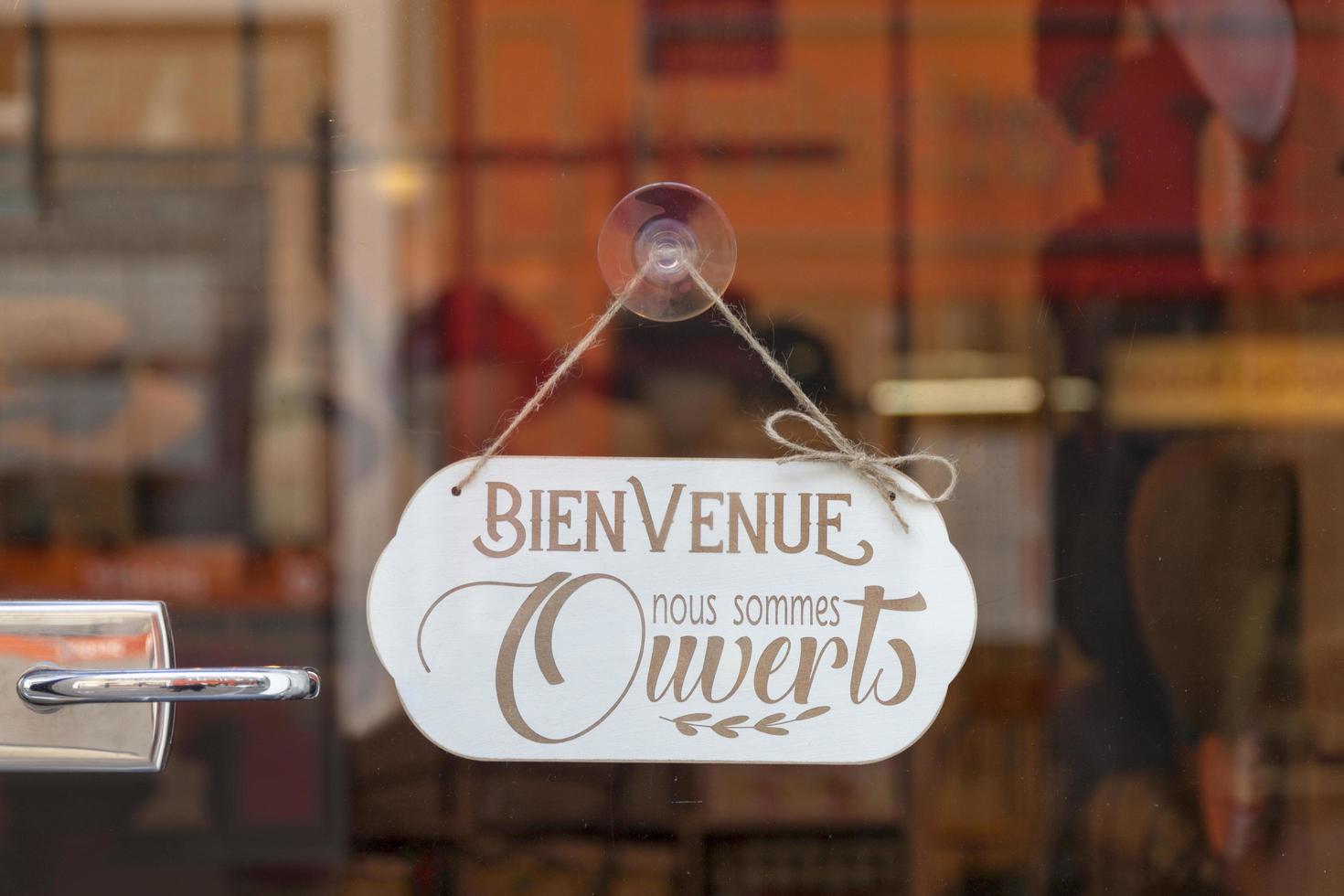 Paris, France - October 13 2021 - Bienvenue, nous sommes ouverts sign photo