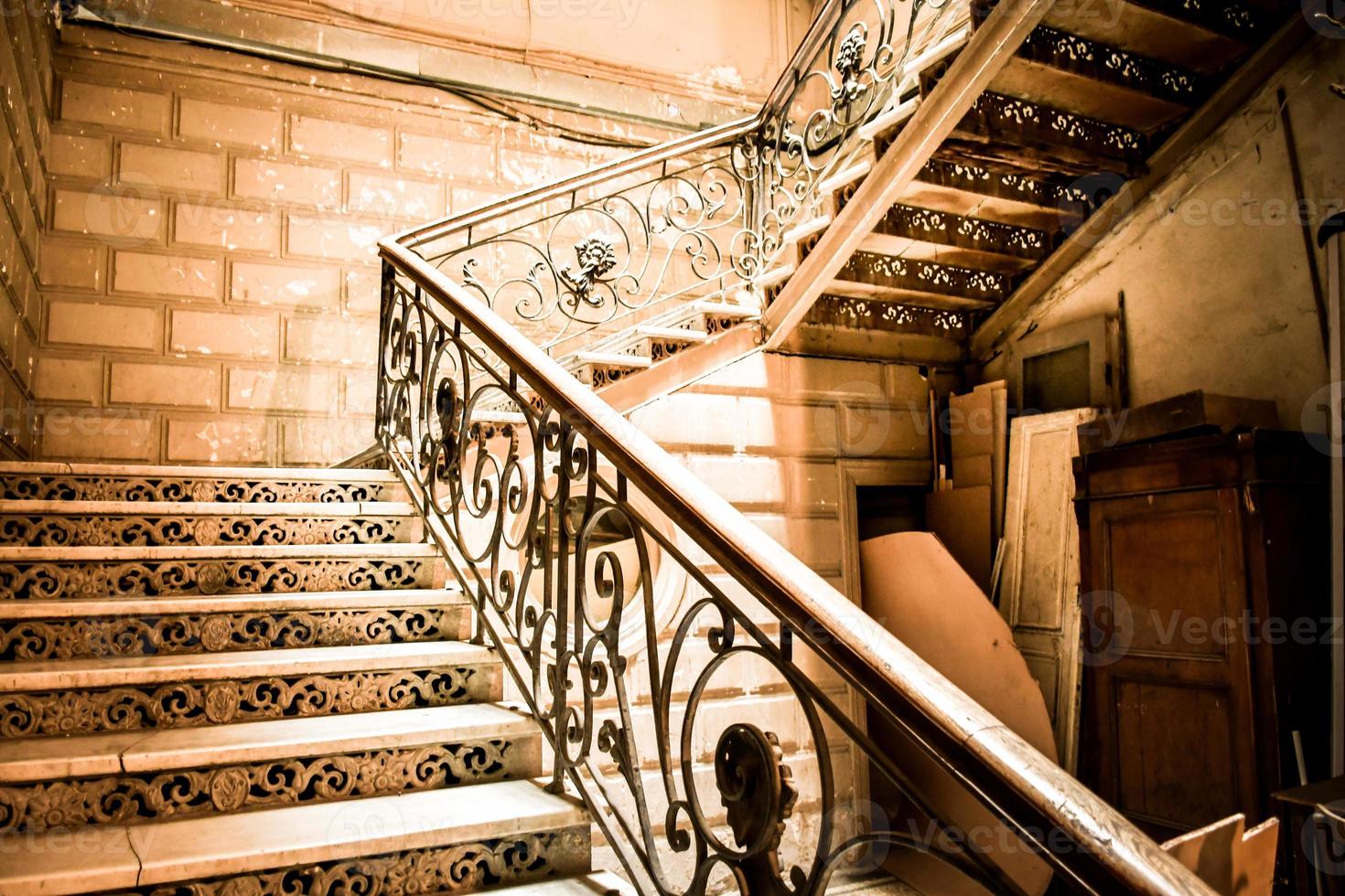 Old stylish staircase in old town sololaki district in Tbilisi, capital Georgia. Traditional houses architecture and hidden gems in caucasus photo