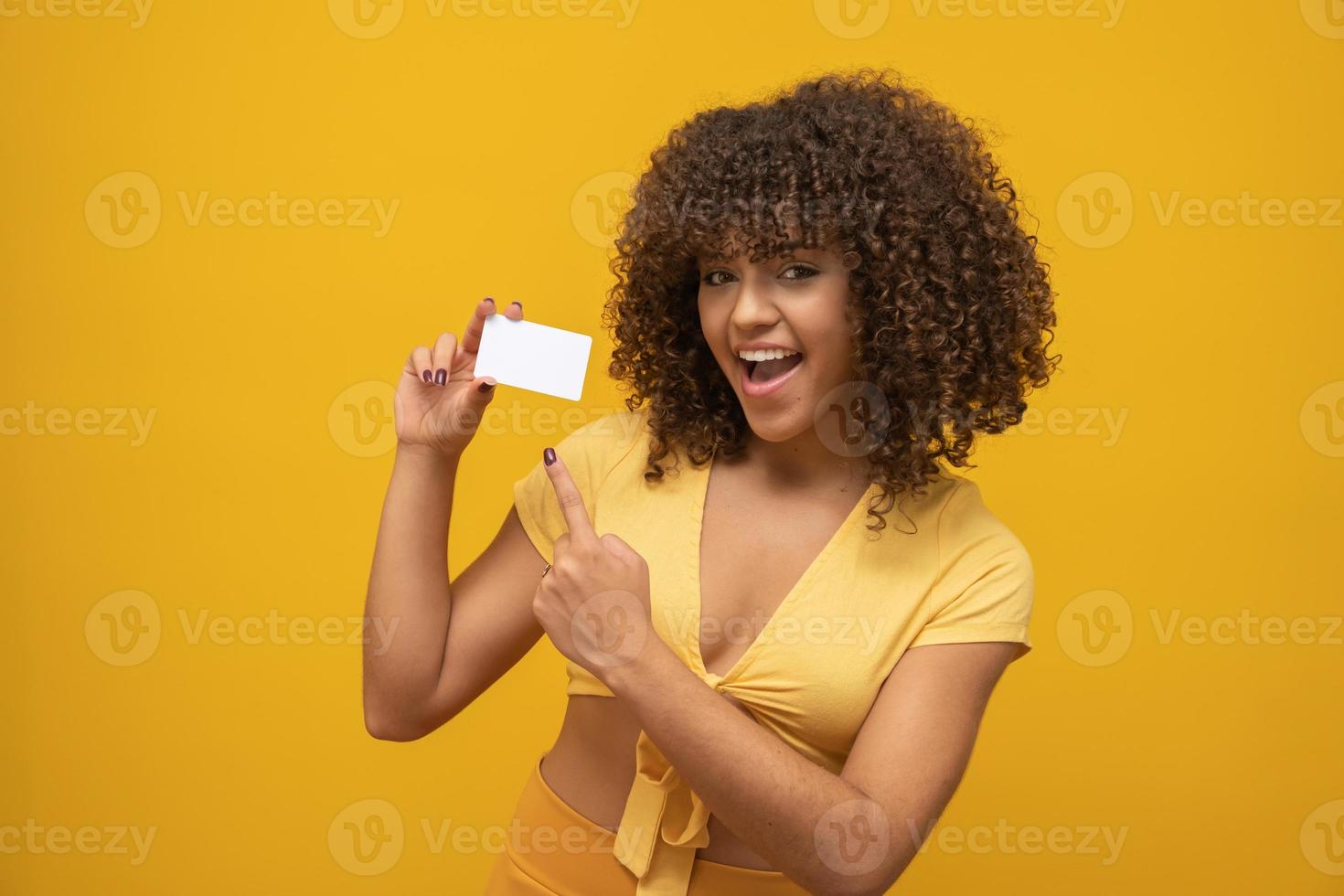 Young woman hand hold blank white card mockup with rounded corners. Plain call-card mock up template holding arm. Plastic credit namecard display front. Check offset card design. Business branding. photo