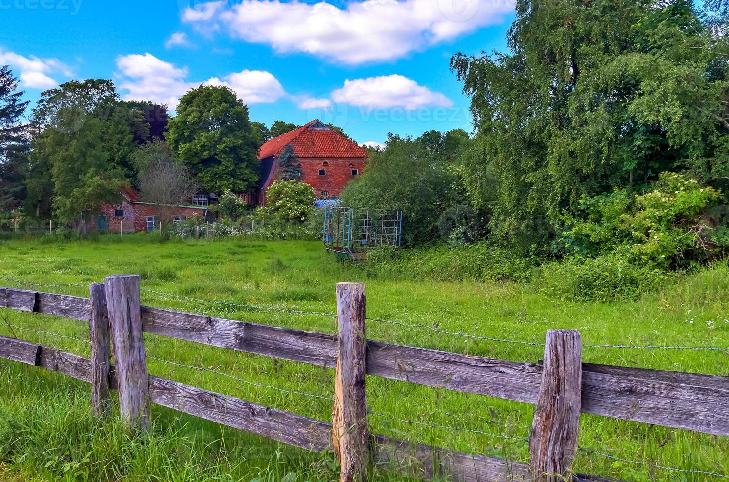 Beautiful wooden horse fence at an agricultural field photo